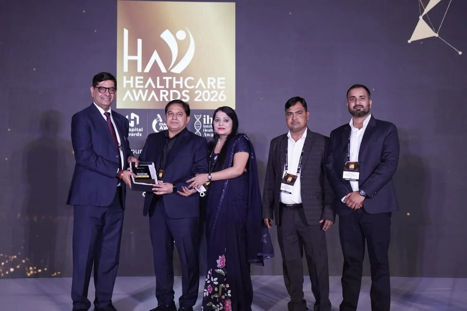 Dr. Kumar Rajesh Ranjan receiving an award at The Economic Times Healthcare Awards 2026