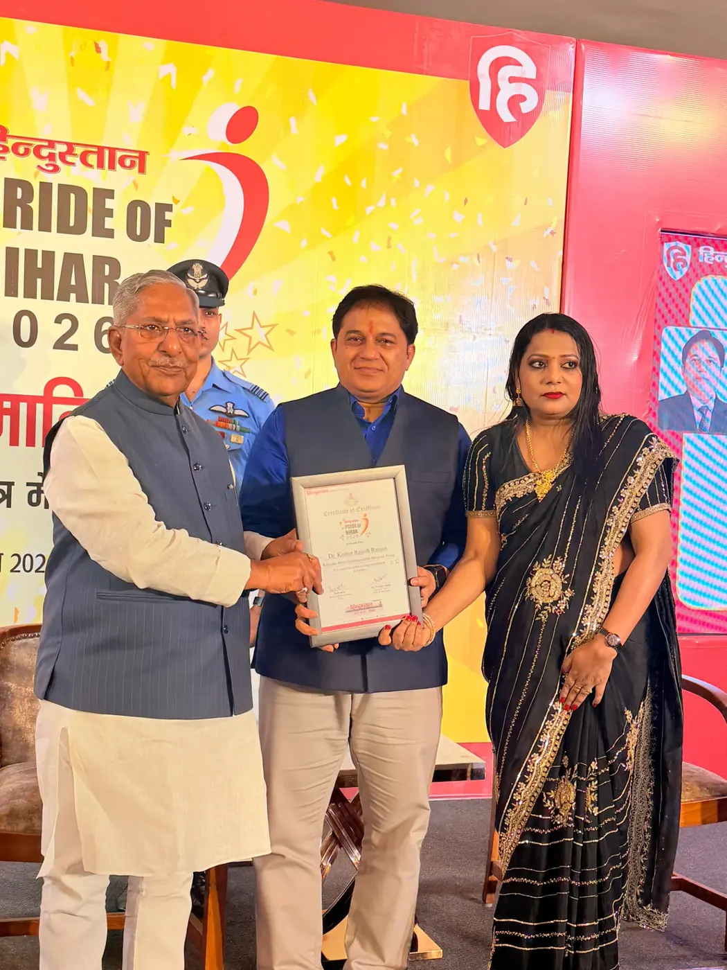 Dr. Kumar Rajesh Ranjan receiving the Hindustan Pride of Bihar 2026 Certificate of Excellence
